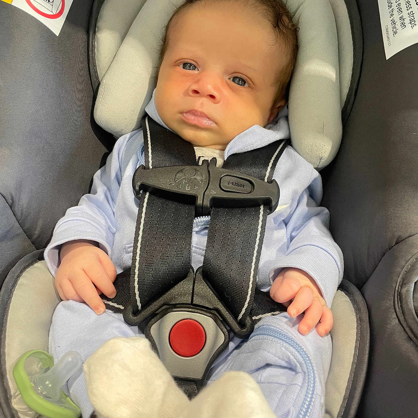 Treyton is registered to the contest to win money with this photo: baby, baby_clothing, baby_gear, baby_sock, car_seat, child, child_seat, closeup, cute, head_support, indoor, infant, newborn, pacifier, portrait, safety, seat_belt, small_hands, soft_fabric, straps