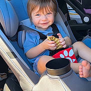 Kohen joined the competition — help win amazing prizes! toddler, child, car_seat, smiling, food, waffle_fry, blue_shirt, seatbelt, car_interior, happy, cute, portrait, sunlight, baby, seat, foot, vehicle, window, safety, casual
