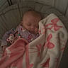 Keely joined the competition — help win amazing prizes! baby, sleeping, blanket, pink, white, bows, pacifier, crib, cushion, clothing, infant, child, resting, indoors, peaceful, soft, comfort, toddler, face, head