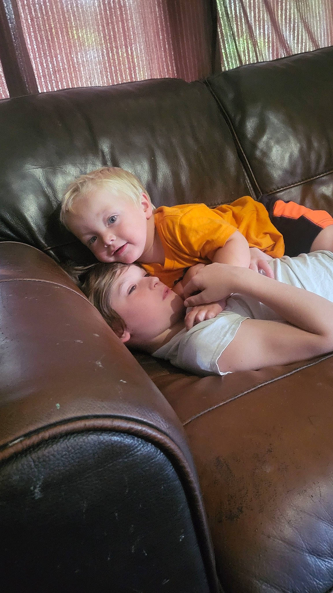 Parker joined the competition — help win amazing prizes! automotive_design, comfort, couch, eye, facial_expression, finger, fun, hairstyle, hand, head, interaction, lap, leg, mammal, motor_vehicle, mouth, muscle, person, smile, thigh