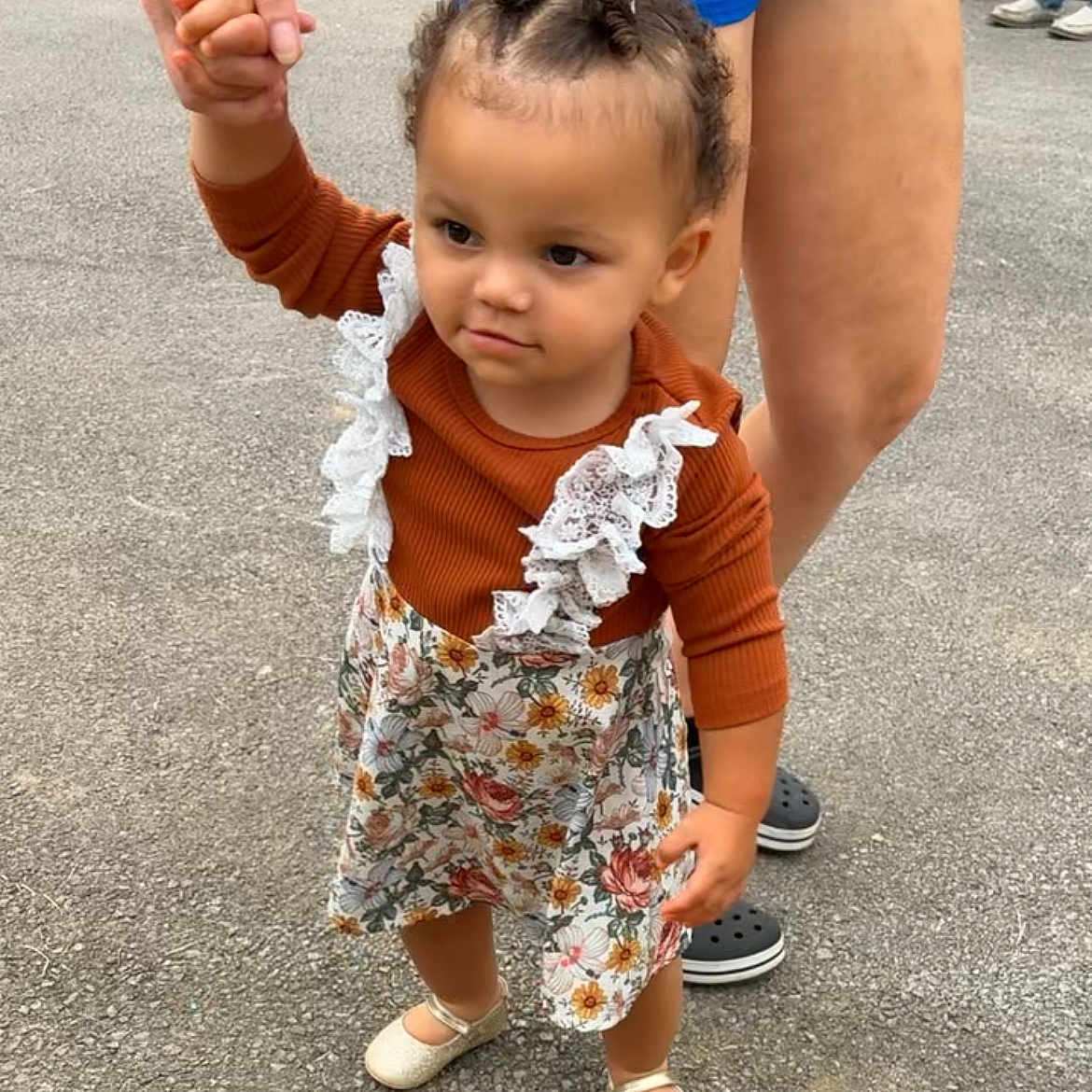 Tyleah joined the competition — help win amazing prizes! adult, black_crocs, blue_shorts, child, cream_shoes, curly_hair, cute, floral_dress, gravel, holding_hand, lace, long_sleeve, outdoor, person, protective, rust_color, summer, toddler, walking, young_child