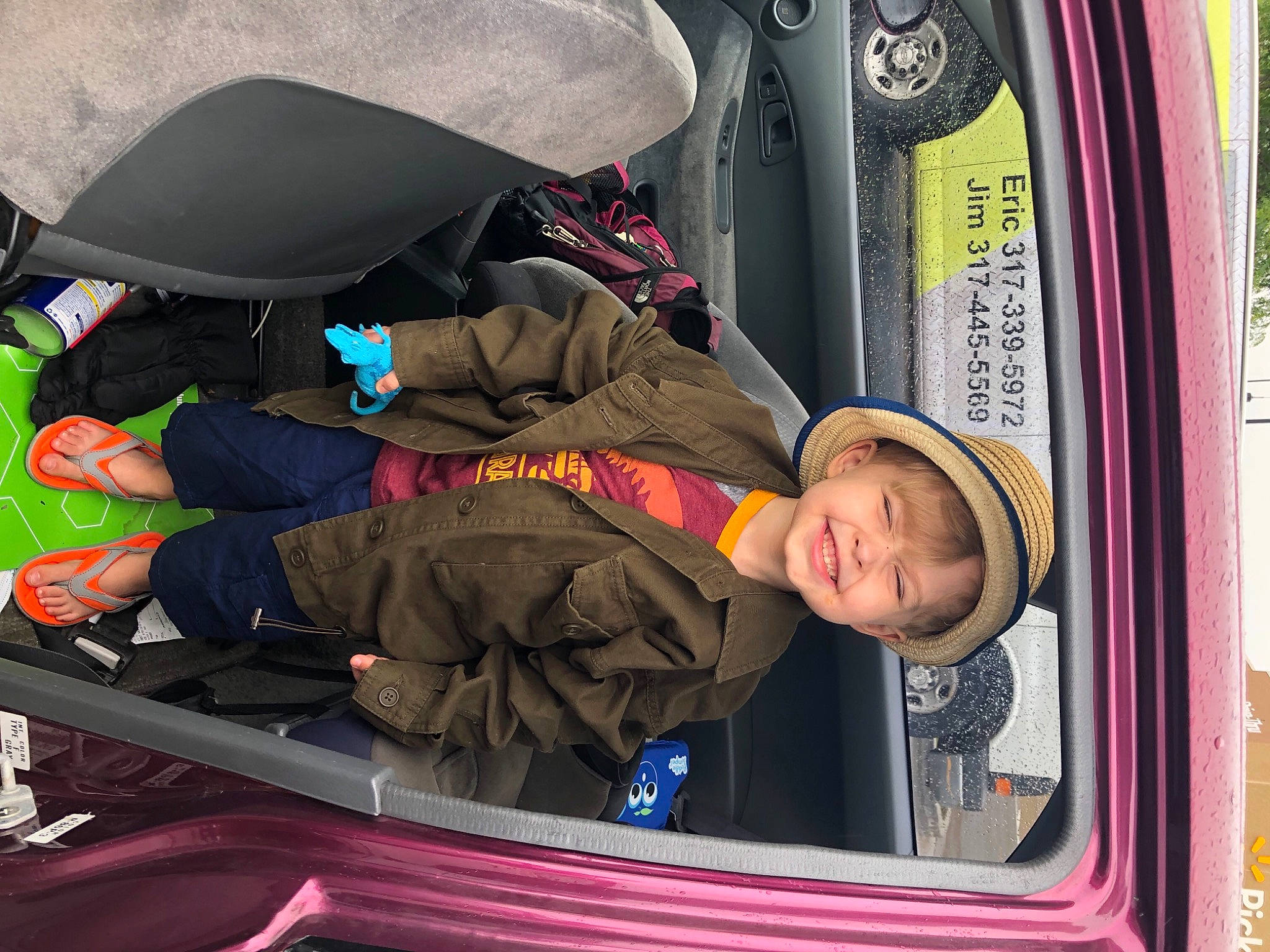 Odin is registered to the contest to win money with this photo: auto_part, automotive_design, automotive_exterior, automotive_window_part, bus, car_seat, hat, jacket, joy, mode_of_transport, motor_vehicle, outerwear, passenger, people, person, product, public_transport, smile, toddler, travel