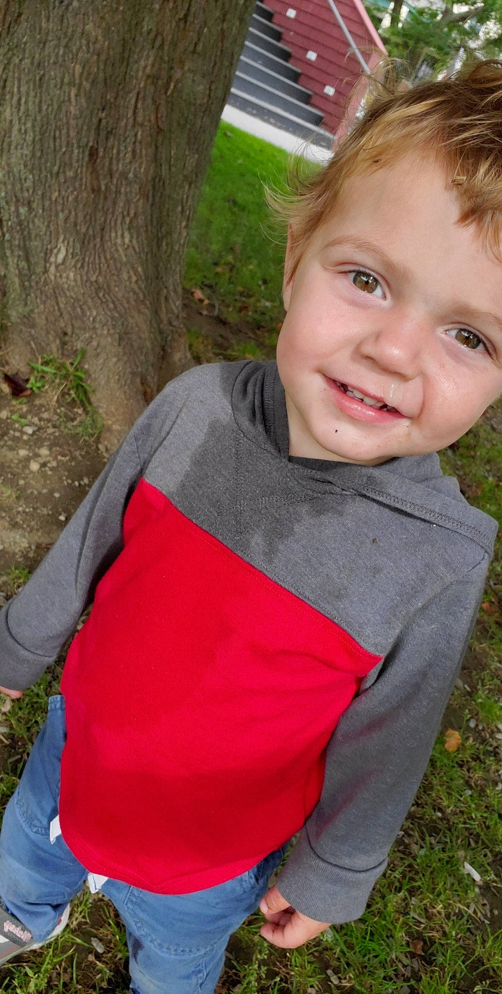 Everett joined the competition — help win amazing prizes! child, child_model, grass, joy, outerwear, person, red, sleeve, smile, t_shirt, toddler, tree