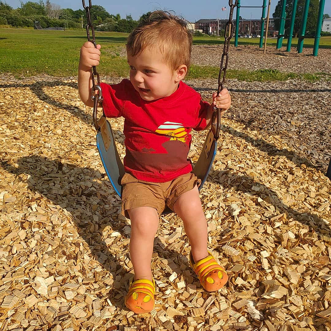 Everett joined the competition — help win amazing prizes! child, fun, outdoor_play_equipment, person, plant, play, playground, public_space, recreation, shorts, soil, swing, toddler, tree