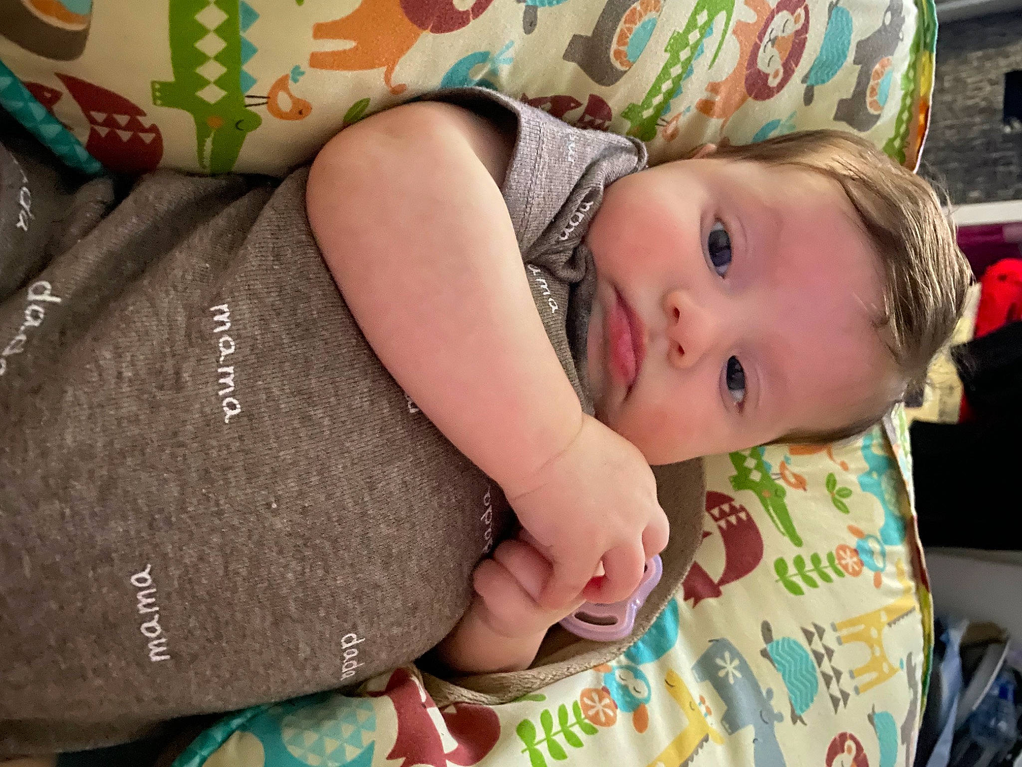 Savannah is registered to the contest to win money with this photo: baby, baby_toddler_clothing, cheek, child, comfort, eye, facial_expression, finger, green, hand, happy, linens, nail, pattern, person, skin, sleeve, smile, textile, toddler