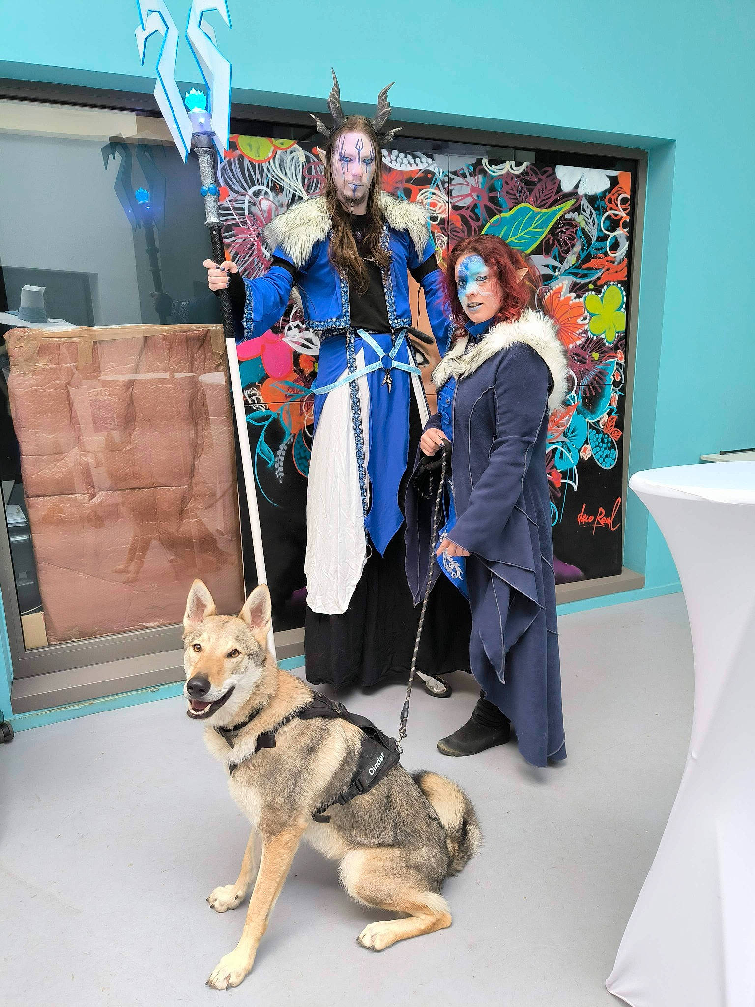 Cinder participe au concours pour gagner de l'argent avec cette photo : art, artist, boot, canidae, canis, carnivore, companion_dog, dog, dog_breed, event, fashion_design, fawn, fun, fur, herding_dog, leash, picture_frame, sporting_group, suit, visual_arts