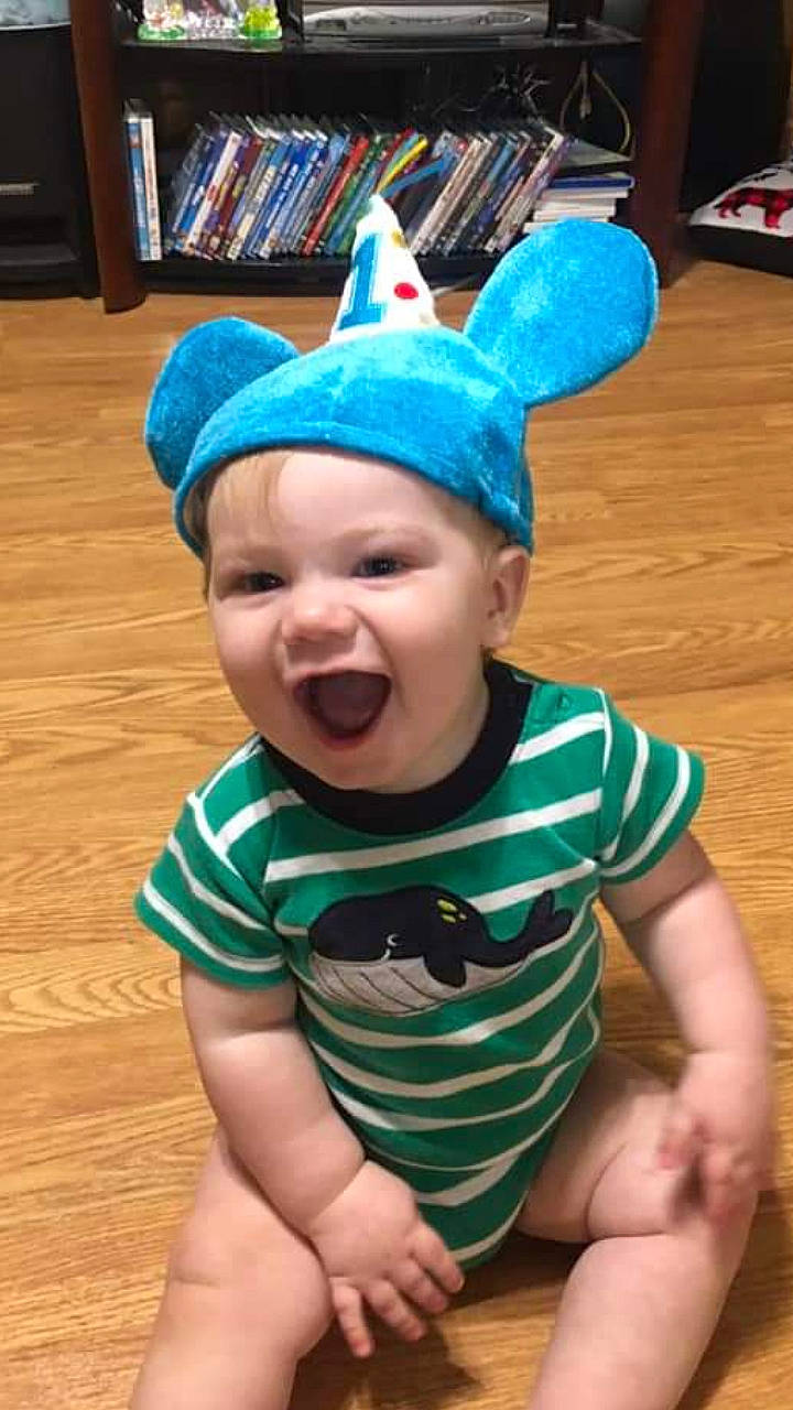Spencer is registered to the contest to win money with this photo: baby, child, costume, ear, fashion_accessory, headgear, headwear, laugh, party_hat, person, play, smile, toddler