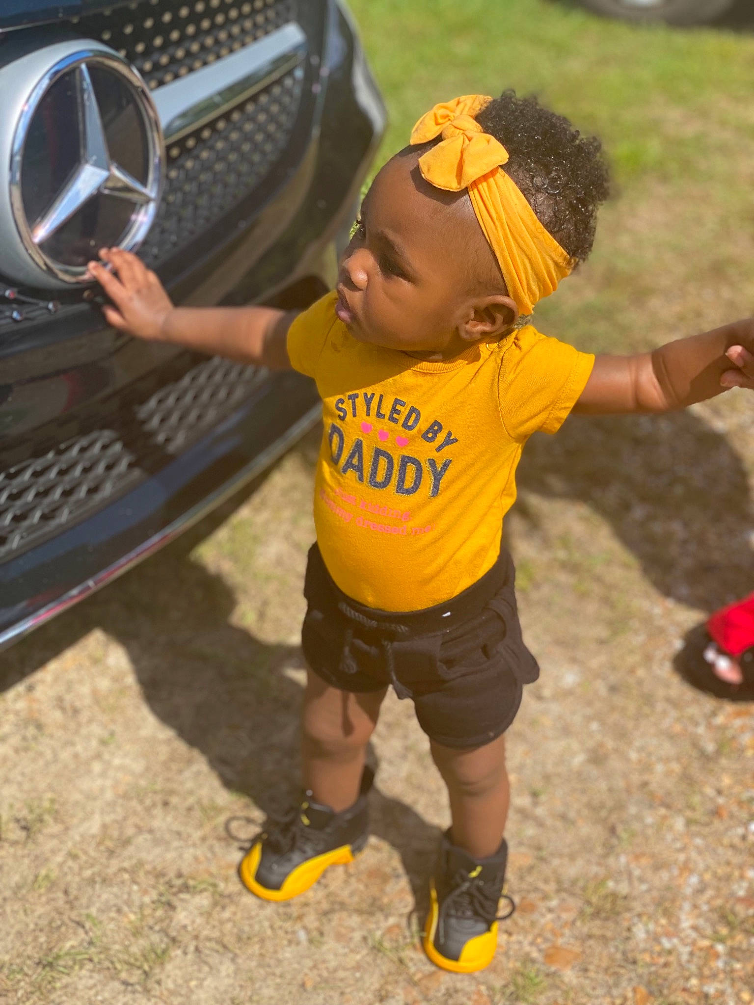 Jalaya joined the competition — help win amazing prizes! automotive_design, automotive_lighting, automotive_tire, baseball_cap, bumper, cap, fender, footwear, grass, grille, happy, hat, headlamp, hood, motor_vehicle, person, rim, shorts, sneakers, tire