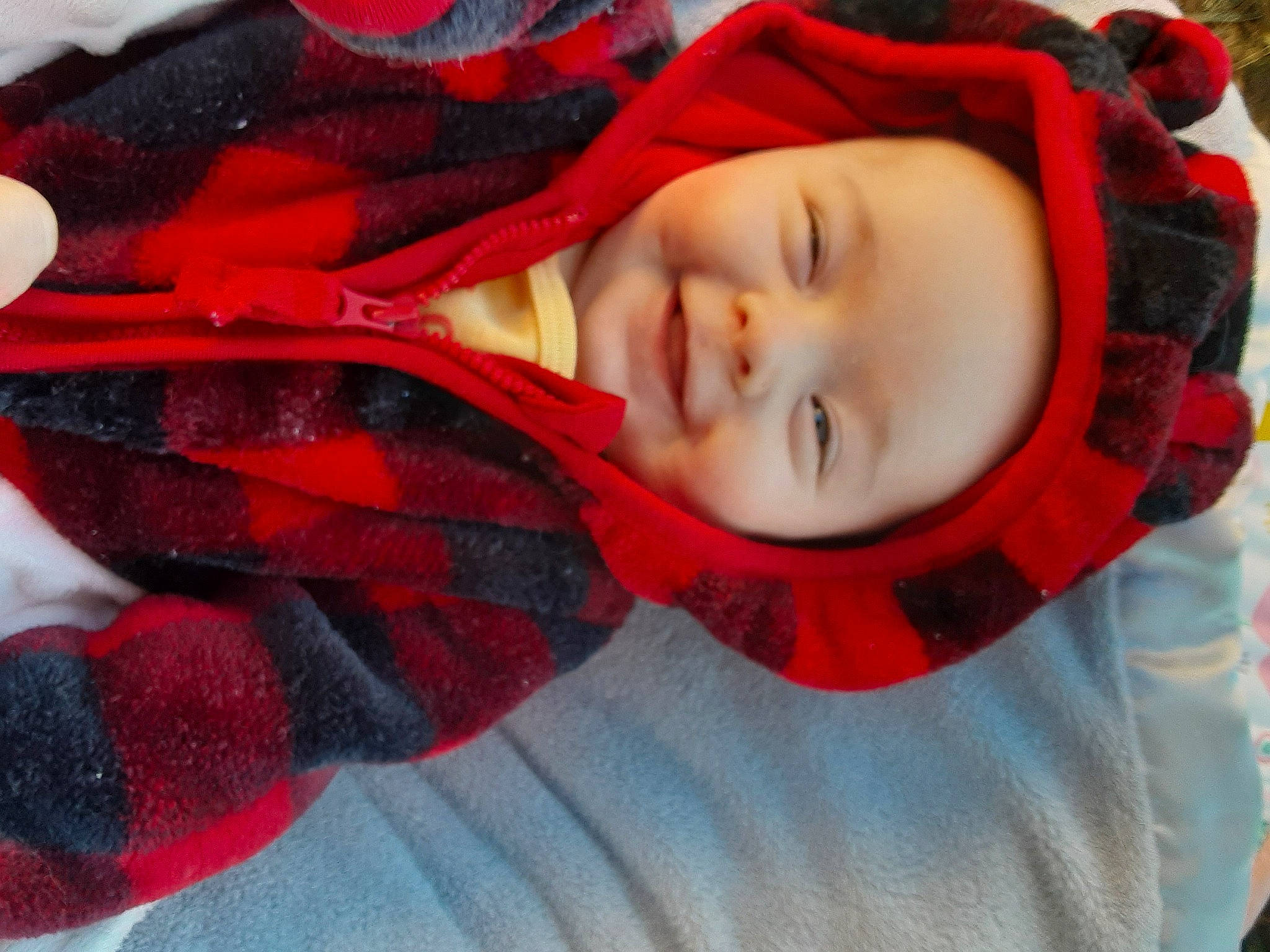 Lucinda joined the competition — help win amazing prizes! black_hair, eye, eyebrow, eyelash, face, hair, happy, headgear, headwear, human_body, jacket, joy, lip, mouth, nose, person, red, skin, sleeve, smile