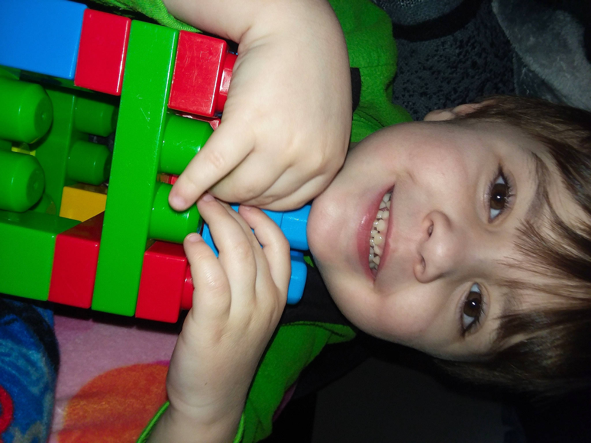 Ericson joined the competition — help win amazing prizes! cheek, child, eye, finger, fun, gesture, green, hand, joy, mouth, nail, nose, person, play, smile, thumb, toddler