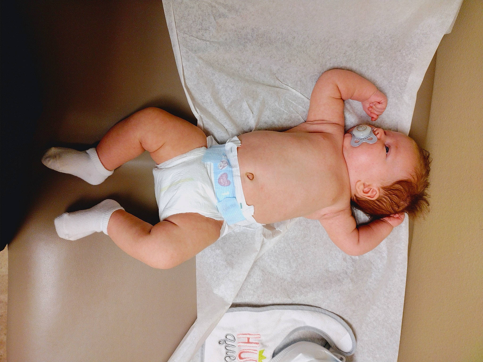 Jordyn is registered to the contest to win money with this photo: abdomen, baby, blond, chest, child, comfort, elbow, finger, human_body, human_leg, joint, knee, leg, person, room, stomach, thigh, toddler, trunk, waist