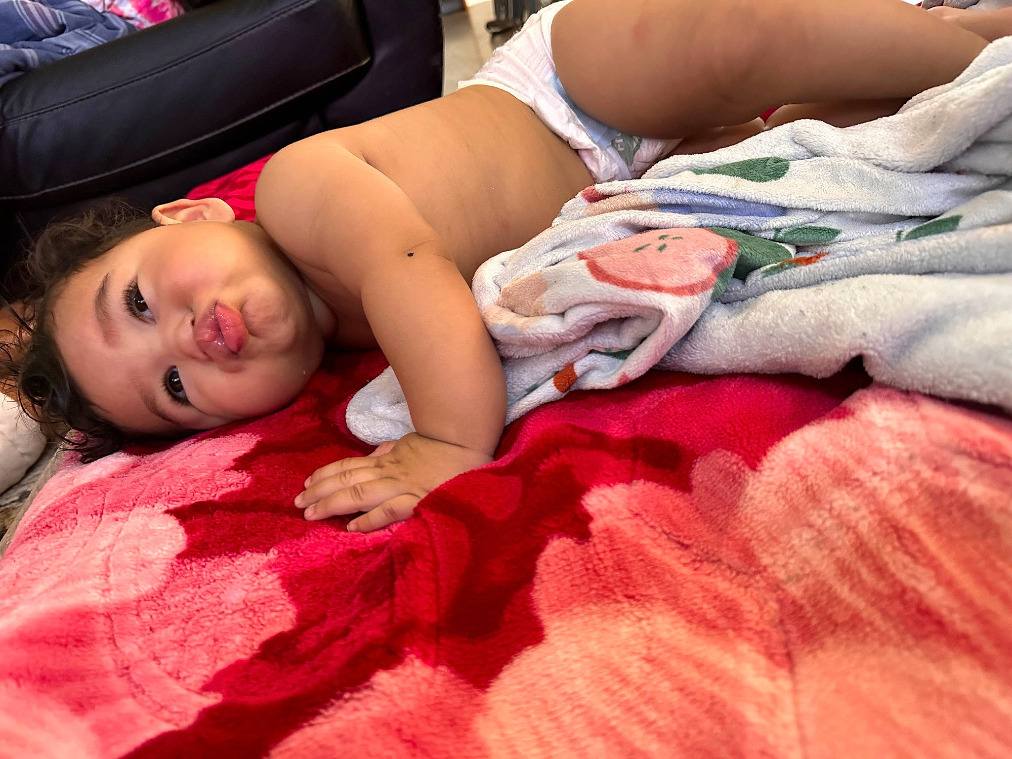 Mercy joined the competition — help win amazing prizes! abdomen, bedding, chest, comfort, flooring, fur, happy, human_leg, knee, linens, magenta, pattern, peach, person, pink, room, skin, textile, thigh, toddler