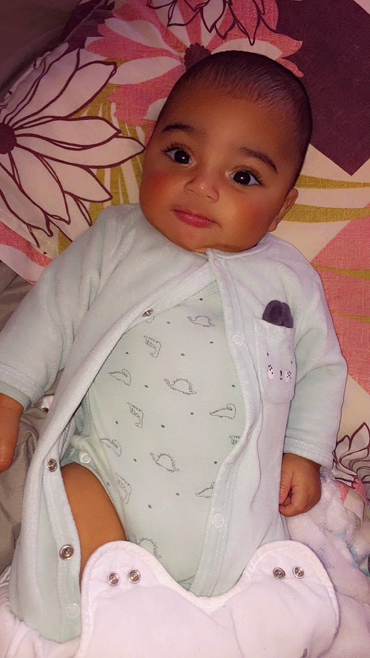 Farès a rejoint le concours — aidez-le/la à gagner de superbes lots ! baby, baby_safety, baby_toddler_clothing, cheek, child, comfort, eye, face, happy, head, nose, pattern, person, pink, product, skin, sleeve, smile, textile, toddler