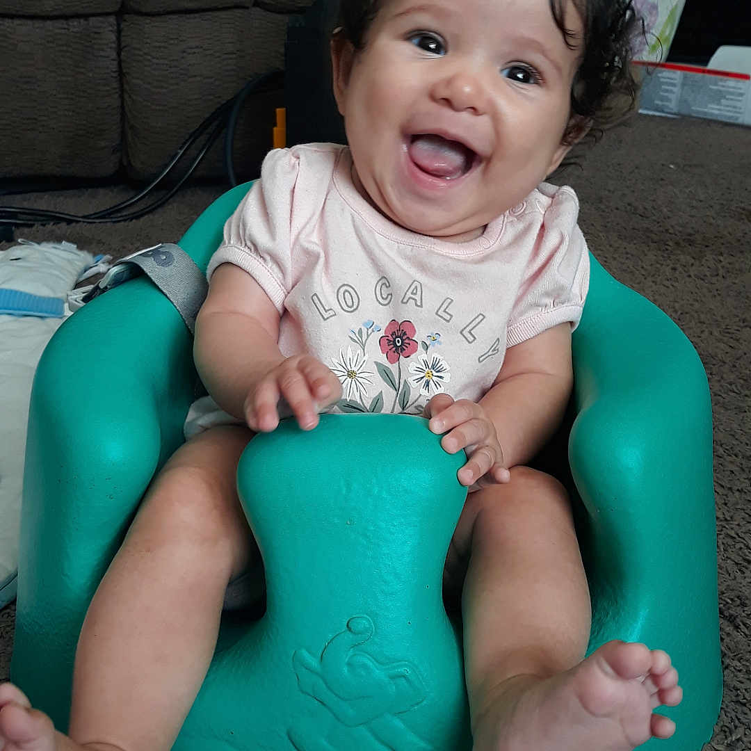 Riley joined the competition — help win amazing prizes! baby, bathroom, bodypart, chair, couch, cushion, face, finger, furniture, hand, happy, head, homedecor, indoors, person, photography, portrait, room, sitting, toilet