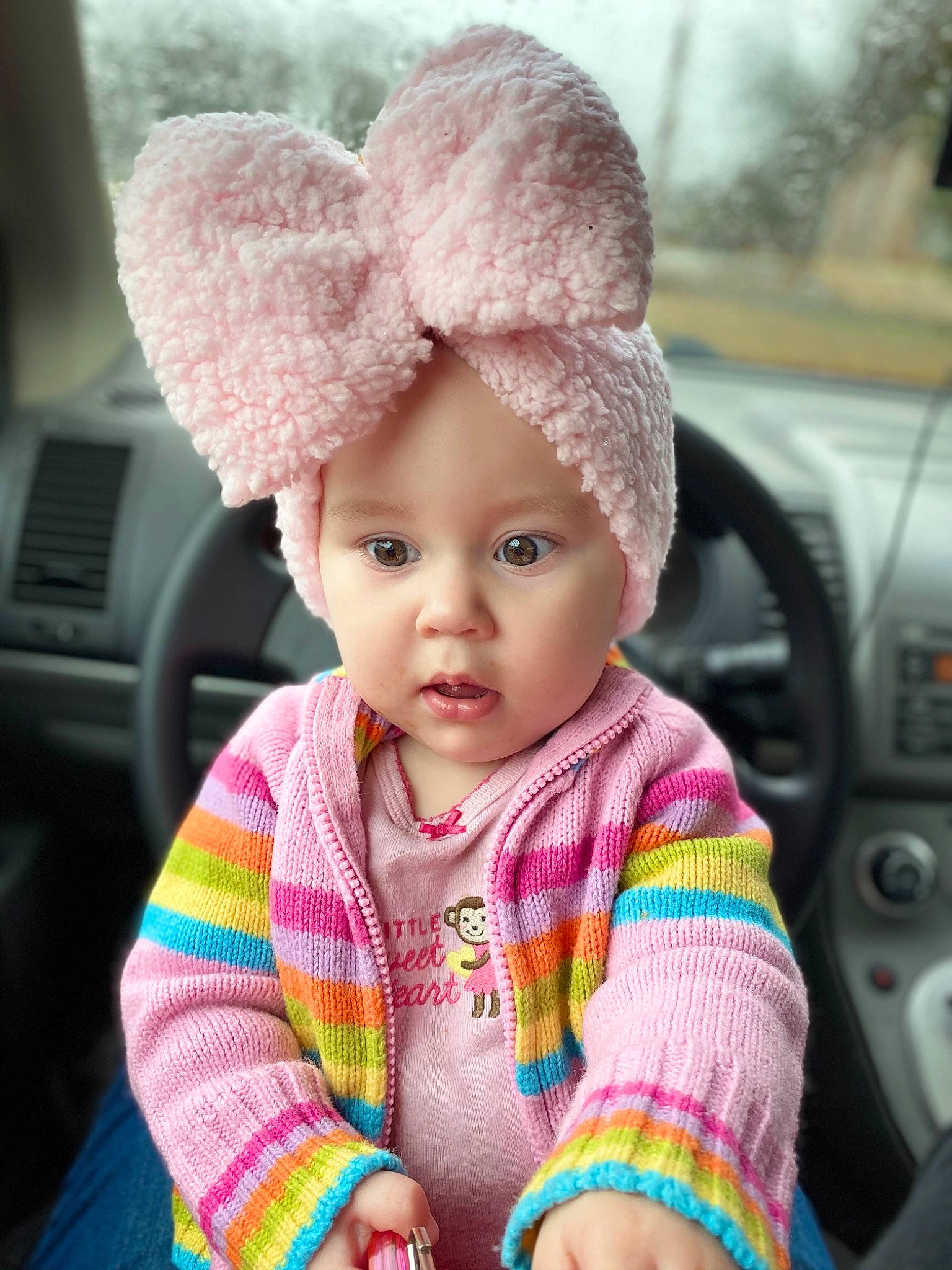 Layken joined the competition — help win amazing prizes! baby, beanie, cap, cheek, child, crochet, ear, eye, face, hat, head, headgear, headwear, knit_cap, knitting, lip, outerwear, person, pink, skin