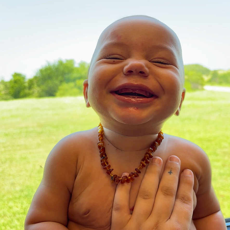 Justin joined the competition — help win amazing prizes! accessories, baby, bodypart, face, finger, grass, hand, happy, head, jewelry, laughing, lawn, nature, necklace, newborn, person, photography, plant, portrait, smile
