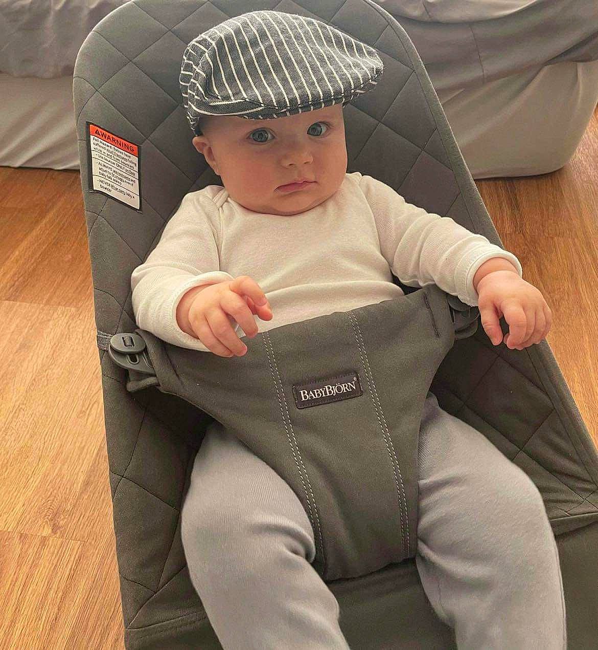 Kai joined the competition — help win amazing prizes! baby, baby_carriage, baby_products, baby_safety, baby_toddler_clothing, blazer, cap, car_seat, child, comfort, fashion_accessory, flooring, headwear, knee, lap, outerwear, person, personal_protective_equipment, sitting, sleeve