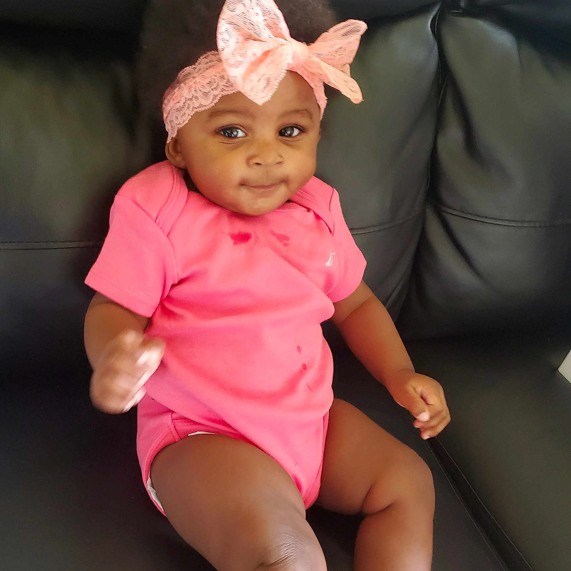 Aphrodite is registered to the contest to win money with this photo: arm, baby, baby_toddler_clothing, child, ear, eye, head, headgear, organ, person, pink, skin, toddler