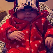 Nevaeh joined the competition — help win amazing prizes! baby, child, onesie, hood, polka_dot, red_clothing, cartoon_face, ears, blanket, cozy, cute, infant, hand, face, portrait, indoor, warm, soft, zipped, seated