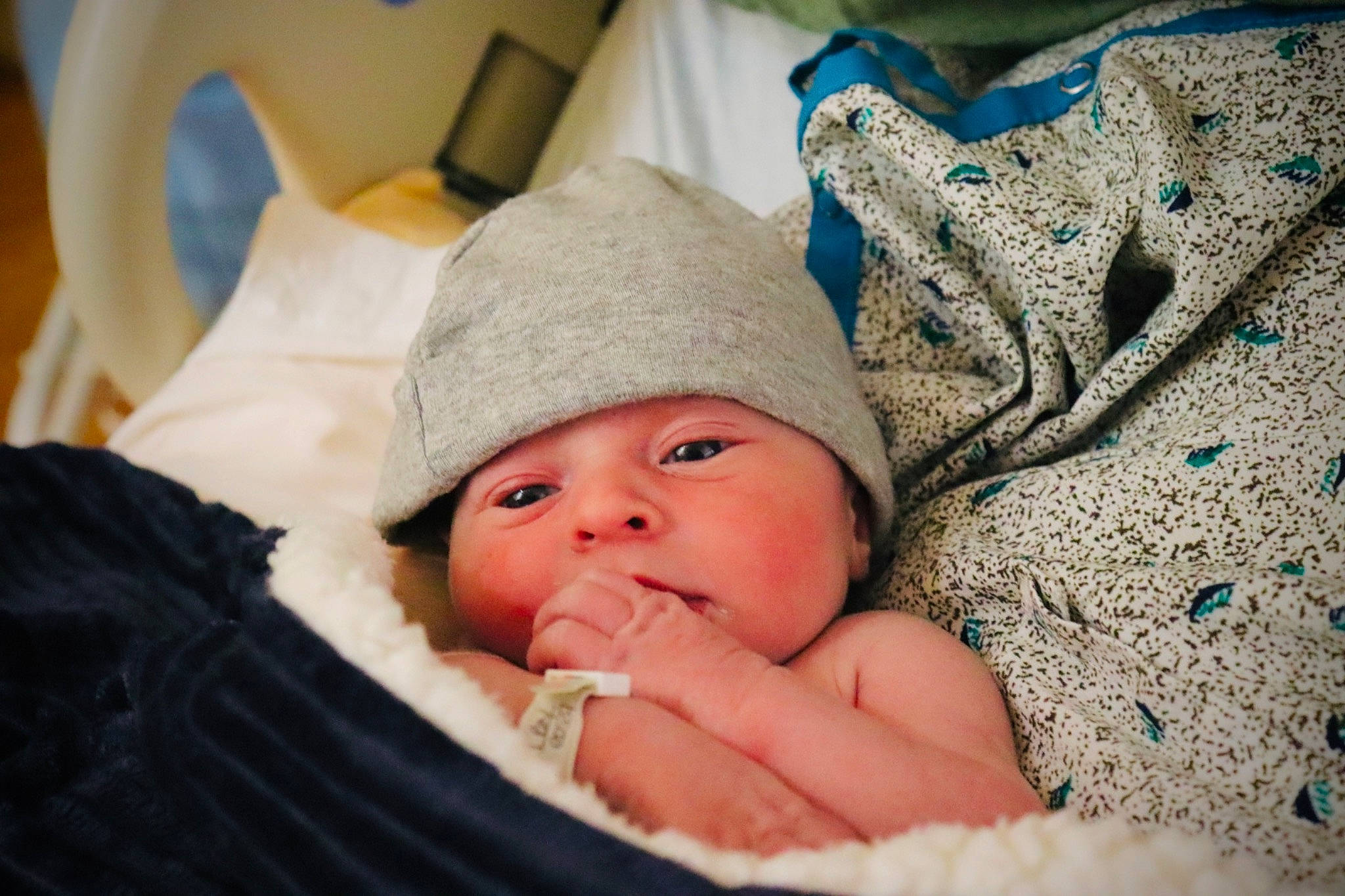 Lochlan joined the competition — help win amazing prizes! baby, baby_products, baby_safety, baby_sleeping, baby_toddler_clothing, beanie, bedtime, blue, cheek, child, comfort, grass, headwear, knit_cap, linens, nap, person, room, skin, sleep