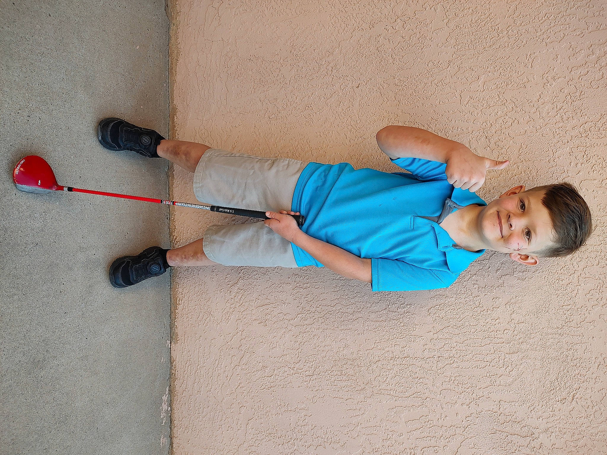 Levi joined the competition — help win amazing prizes! clothing, comfort, elbow, electric_blue, flooring, footwear, human_body, human_leg, joint, joy, knee, leg, outdoor_shoe, person, shoe, shoulder, sleeve, sneakers, sportswear, t_shirt