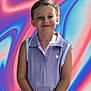 child, smiling, dress, purple, heart, portrait, person, standing, background, colorful, digital_art, young, girl, casual_clothing, short_sleeves, happy, cute, posing, indoor, fashion
