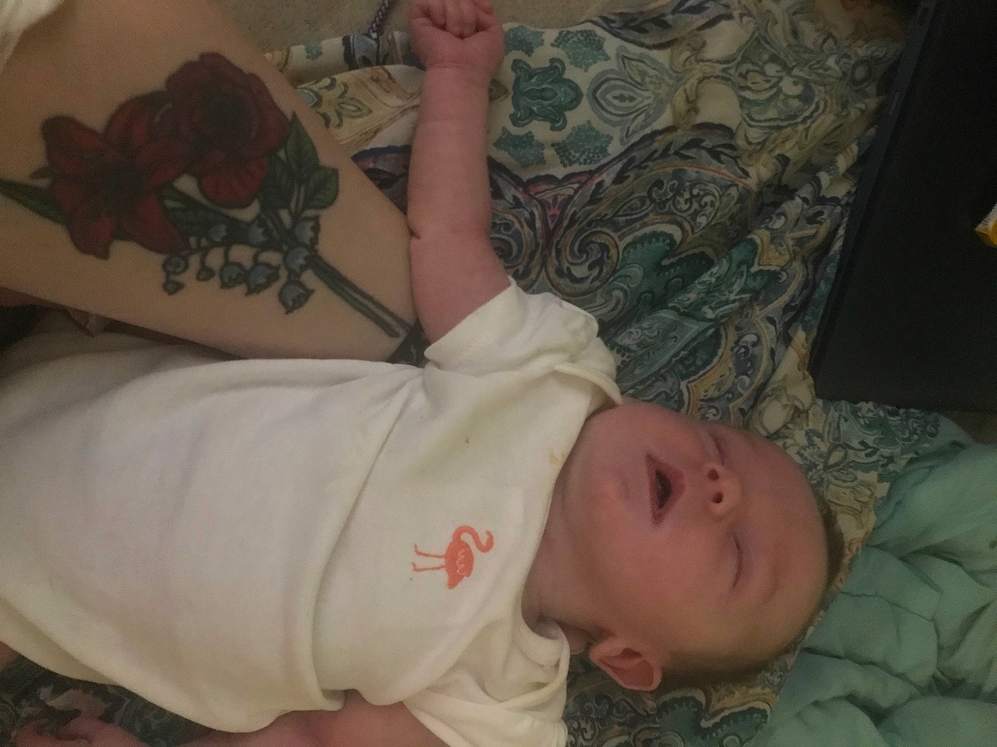 Mercedes is registered to the contest to win money with this photo: baby, baby_toddler_clothing, cheek, chest, child, comfort, elbow, finger, flesh, linens, mouth, pattern, person, room, skin, sleep, sleeve, tattoo, temporary_tattoo, toddler