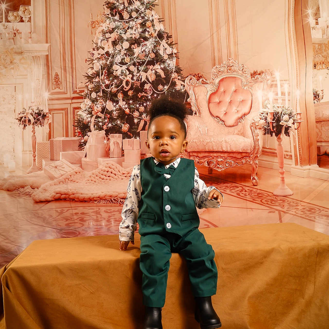 Jerrell is registered to the contest to win money with this photo: boy, child, christmas, christmasdecorations, christmastree, clothing, coat, face, festival, happy, hardwood, head, male, pants, person, photography, portrait, sitting, smile, wood