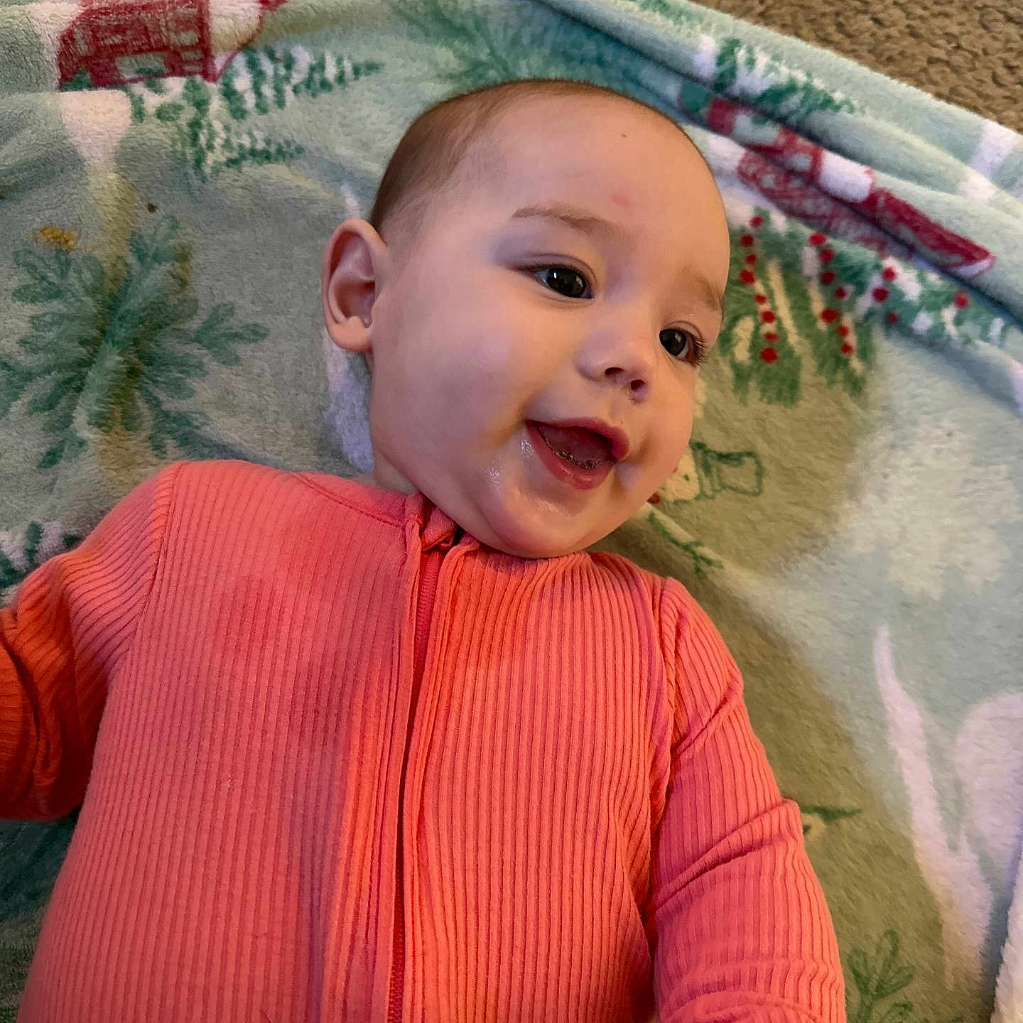 Chevelle is registered to the contest to win money with this photo: baby, babylaughing, blanket, bodypart, clothing, face, finger, furniture, hand, happy, head, knitwear, laughing, mouth, person, photography, portrait, quilt, smile, sweater