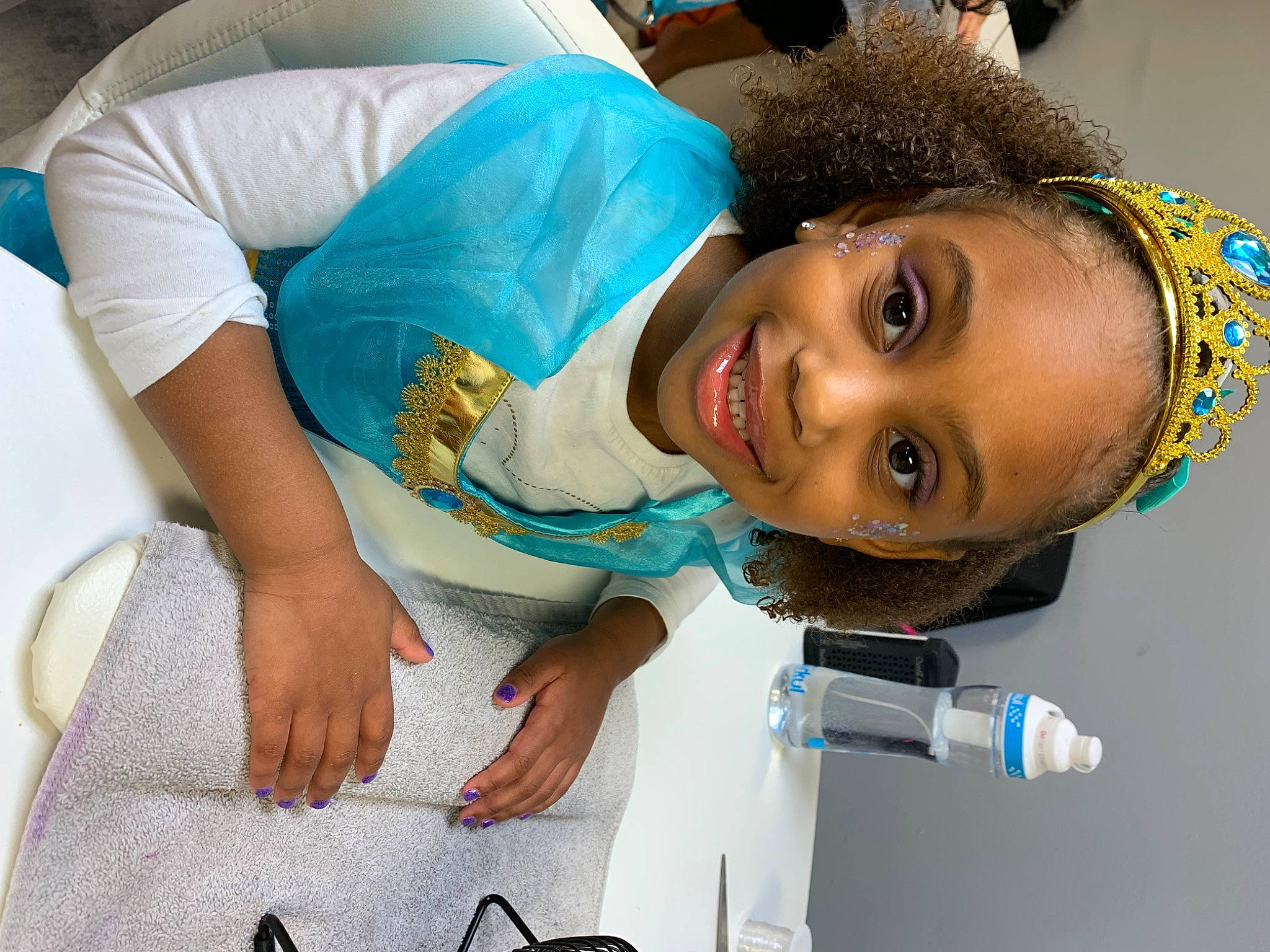 Amaya joined the competition — help win amazing prizes! abdomen, blue, child, elbow, electric_blue, event, fun, happy, hat, health_care, hospital, joy, leisure, medical, person, plastic_bottle, room, service, skin, smile