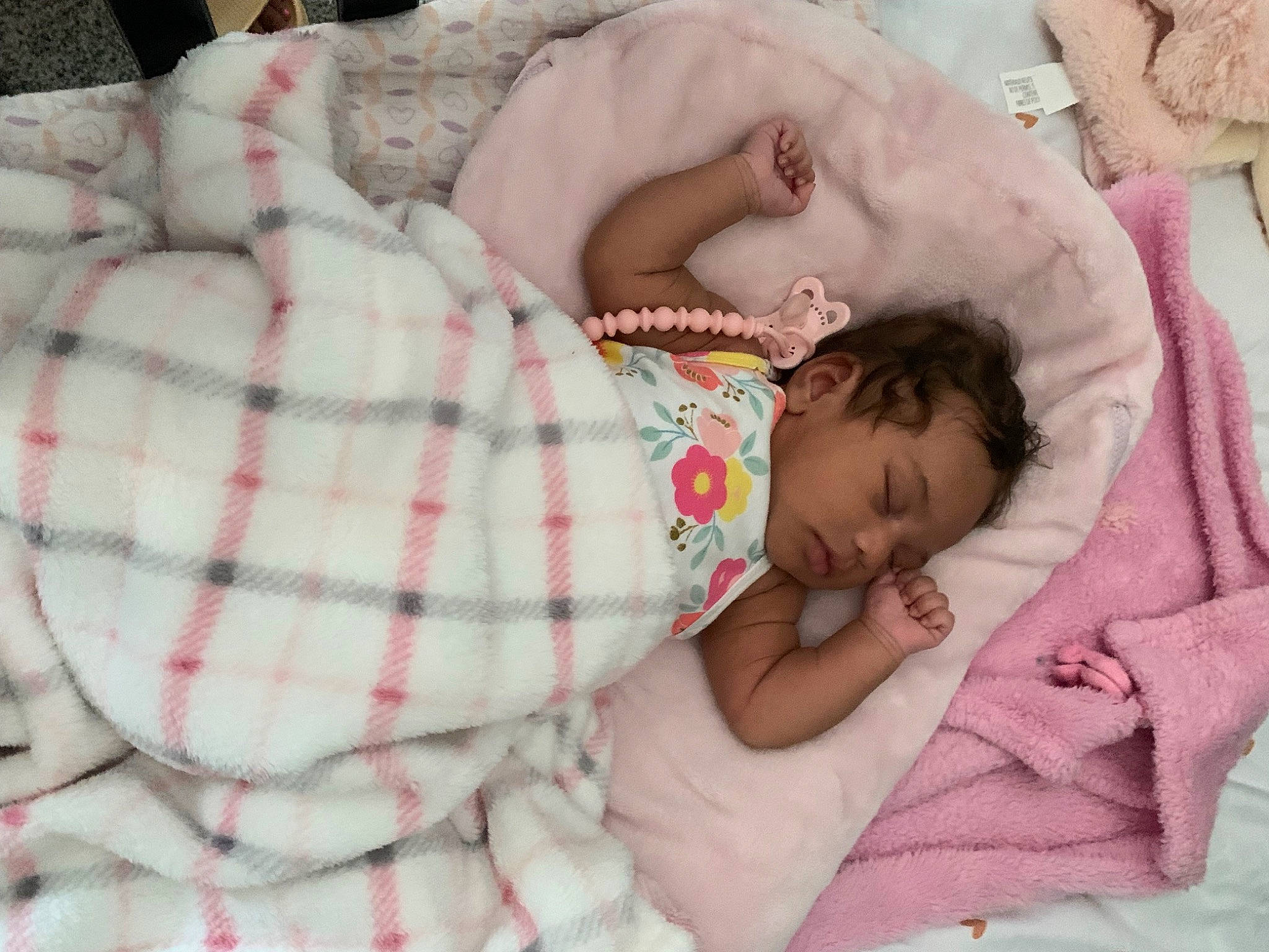 Ariya joined the competition — help win amazing prizes! baby, baby_products, baby_sleeping, baby_toddler_clothing, bed, bedding, bedtime, child, comfort, face, hand, head, linens, nap, pattern, person, plaid, skin, tartan, textile