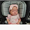 baby, infant, sleeping, car_seat, pink_clothing, headband, bow, butterfly_pattern, portrait, indoors, seated, child, face, closed_eyes, peaceful, screenshot, contest, voting, mobile_screen, baby_carrier