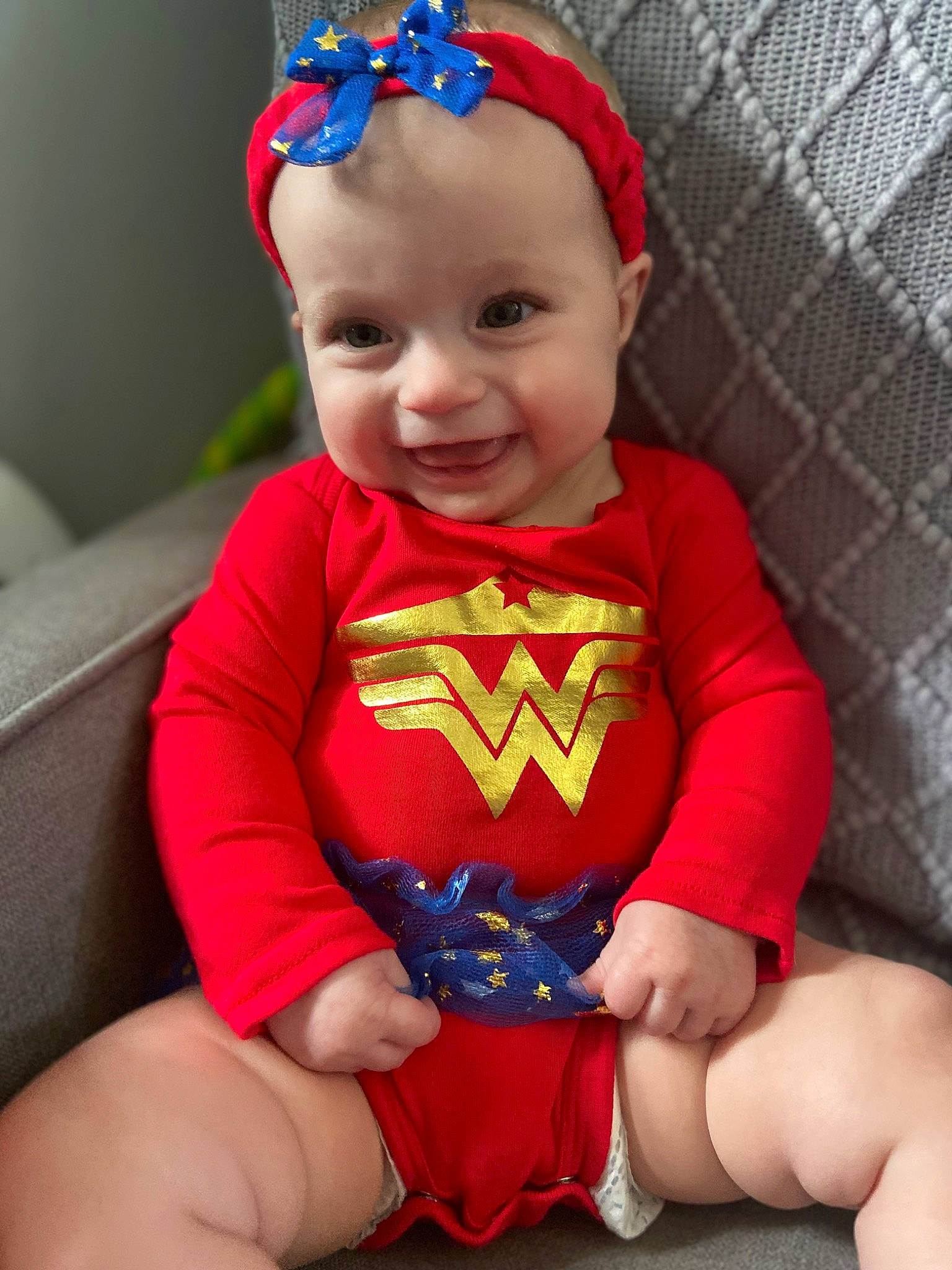 Ryleigh is registered to the contest to win money with this photo: baby, baby_toddler_clothing, blue, cap, child, costume_hat, electric_blue, eye, face, fictional_character, fun, happy, head, headwear, joy, magenta, person, red, sleeve, smile