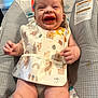 baby, bib, food, messy, smiling, happy, infant, child, cute, sitting, highchair, clothing, indoors, face, skin, expression, joy, playful, colorful, comfort