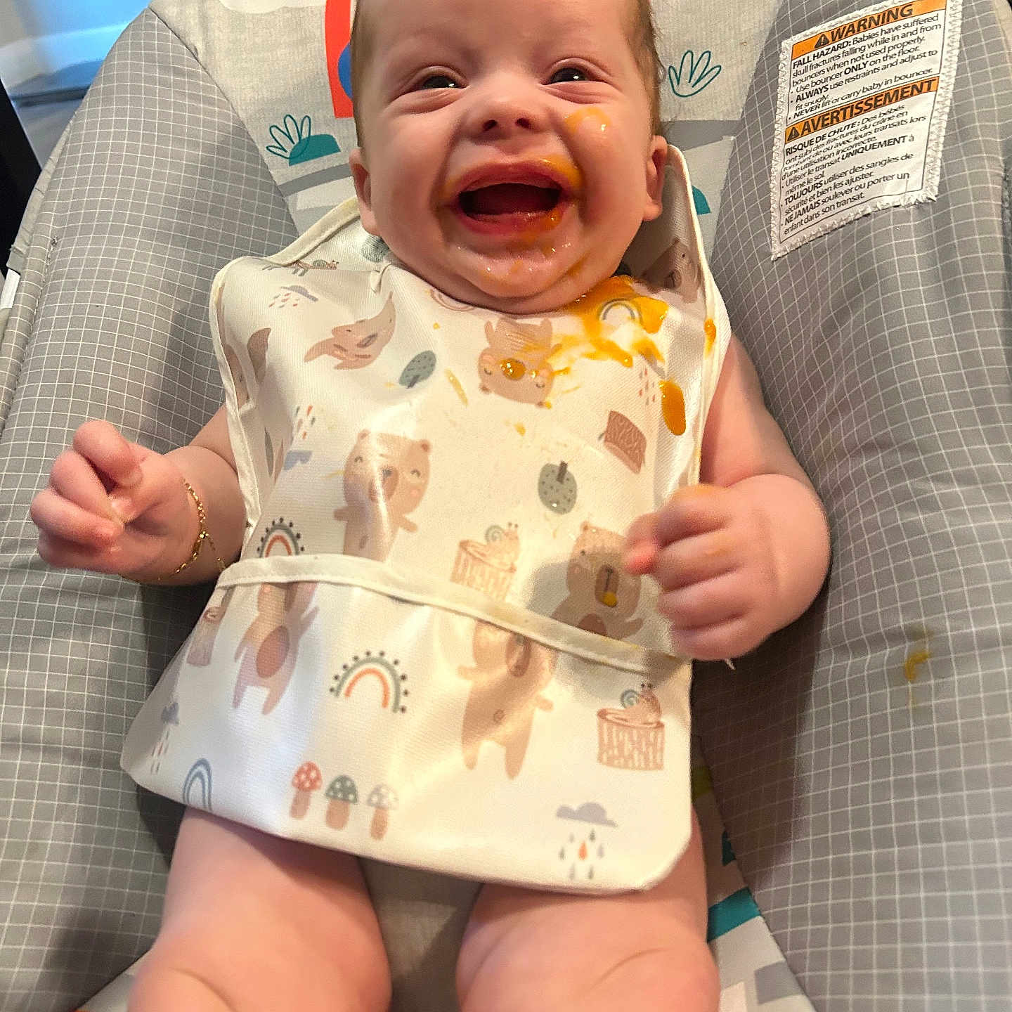 Montrell joined the competition — help win amazing prizes! baby, bib, child, clothing, colorful, comfort, cute, expression, face, food, happy, highchair, indoors, infant, joy, messy, playful, sitting, skin, smiling