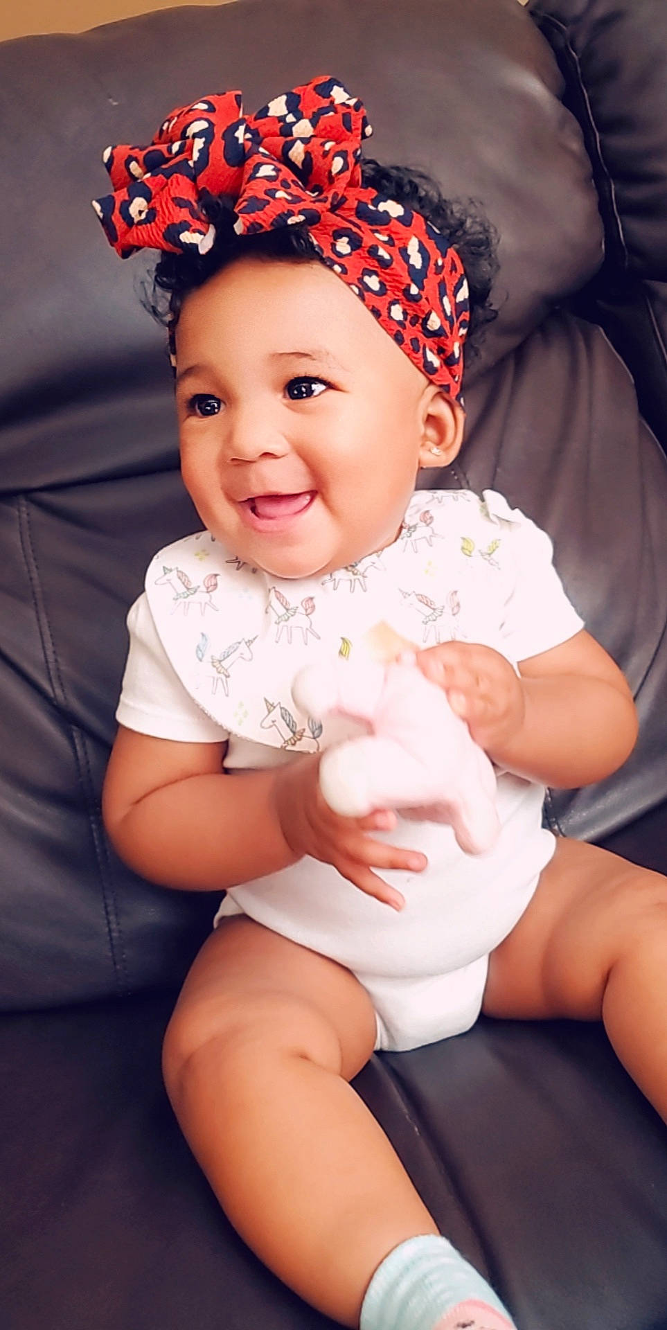 Mila is registered to the contest to win money with this photo: baby, cap, child, child_model, hair_accessory, hand, happy, headband, headgear, headpiece, joy, person, photo_shoot, photography, portrait_photography, sitting, smile, toddler