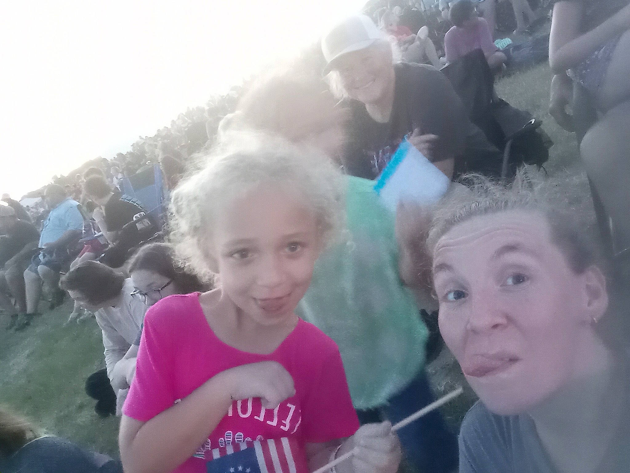 Teegan joined the competition — help win amazing prizes! child, crowd, event, fun, grass, happy, joy, laugh, leisure, magenta, party, person, pink, public_event, recreation, sky, smile, style, surprise, t_shirt