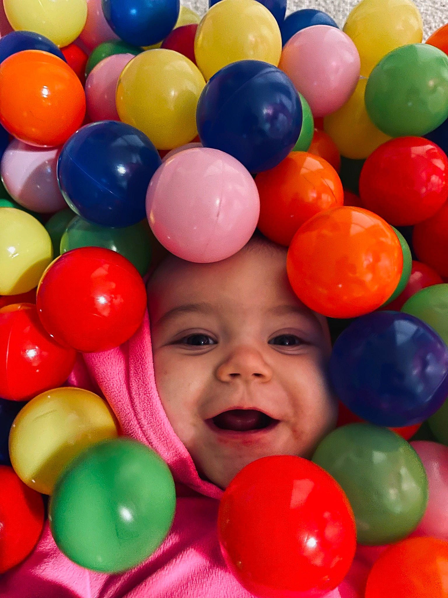 Aubreigh is registered to the contest to win money with this photo: ball_pit, balloon, beauty, child, event, facial_expression, fun, happy, headwear, organ, party_supply, people, person, photograph, play, product, red, smile, toddler, toy