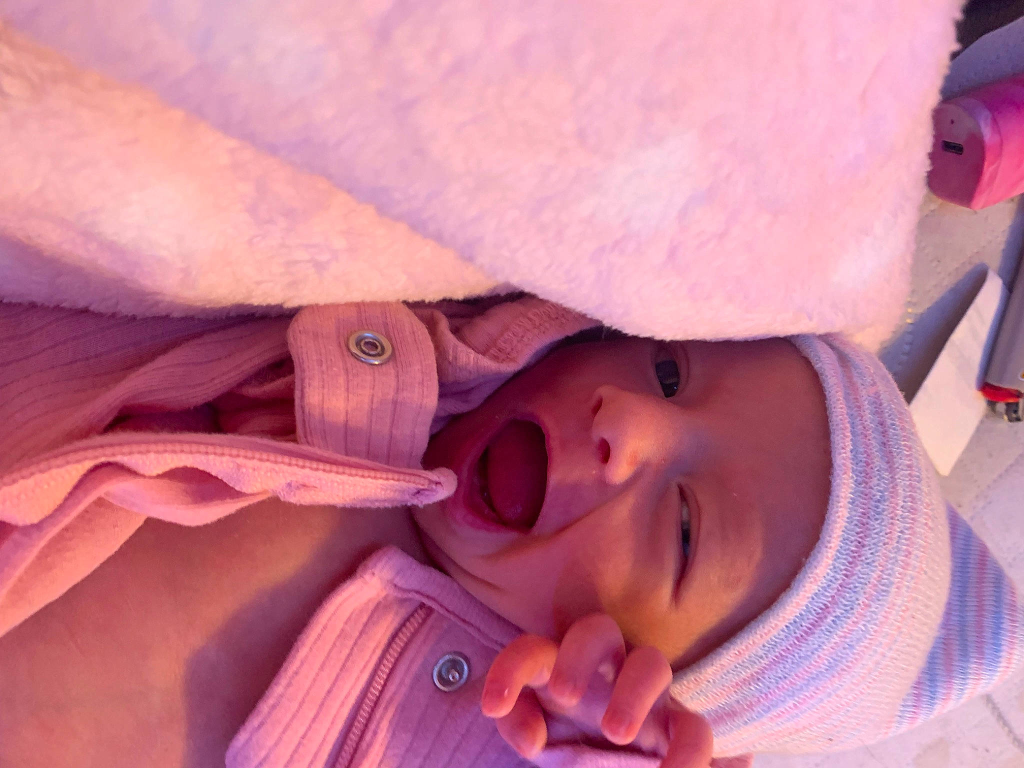 Cleo is registered to the contest to win money with this photo: baby, baby_toddler_clothing, cheek, child, comfort, eyelash, finger, fun, happy, hat, headwear, lip, nail, nose, peach, person, pink, purple, skin, smile