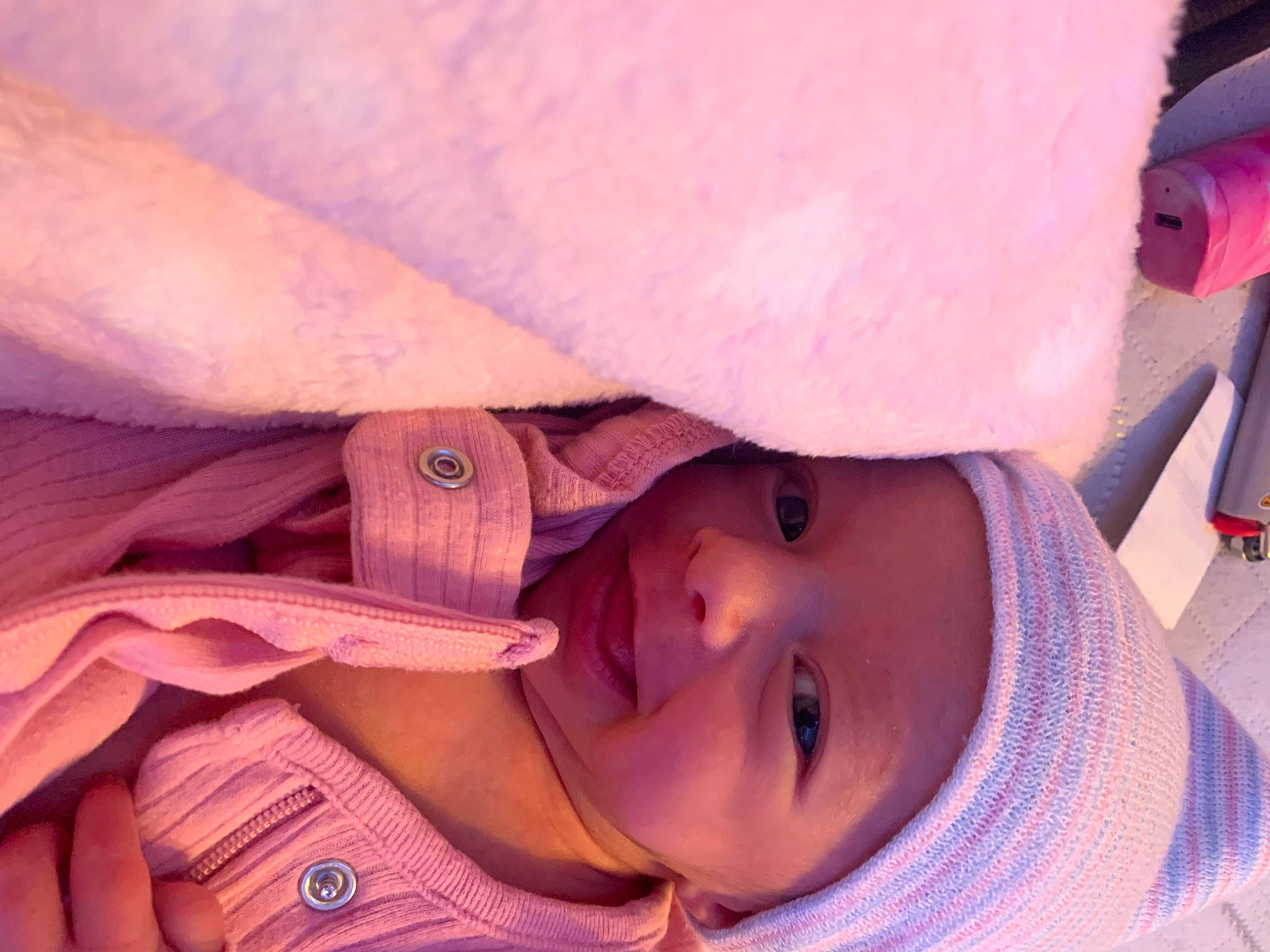 Cleo is registered to the contest to win money with this photo: baby, cheek, child, chin, comfort, eyelash, finger, fun, happy, hat, headgear, headwear, lip, mouth, nose, person, pink, purple, skin, smile