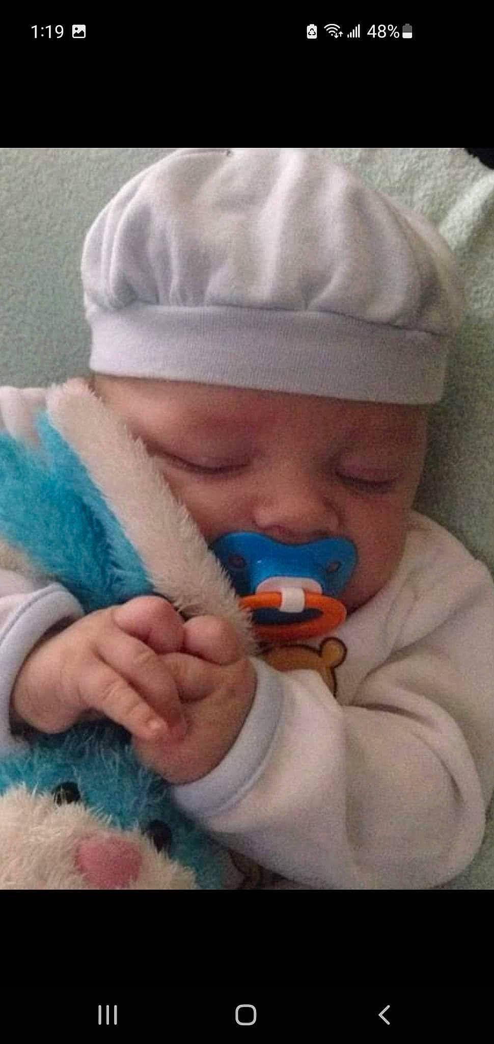 Kaylub joined the competition — help win amazing prizes! baby, baby_sleeping, beard, cap, cheek, child, comfort, eye, finger, gesture, headwear, knit_cap, linens, mouth, nail, nose, person, product, skin, textile