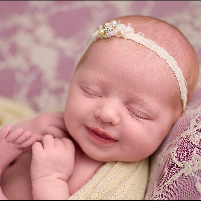Audi-Kole joined the competition — help win amazing prizes! baby, blanket, closeup, cushion, cute, feet, hands, headband, indoors, infant, lace, newborn, peaceful, portrait, purple, resting, skin, sleeping, smile, soft_texture