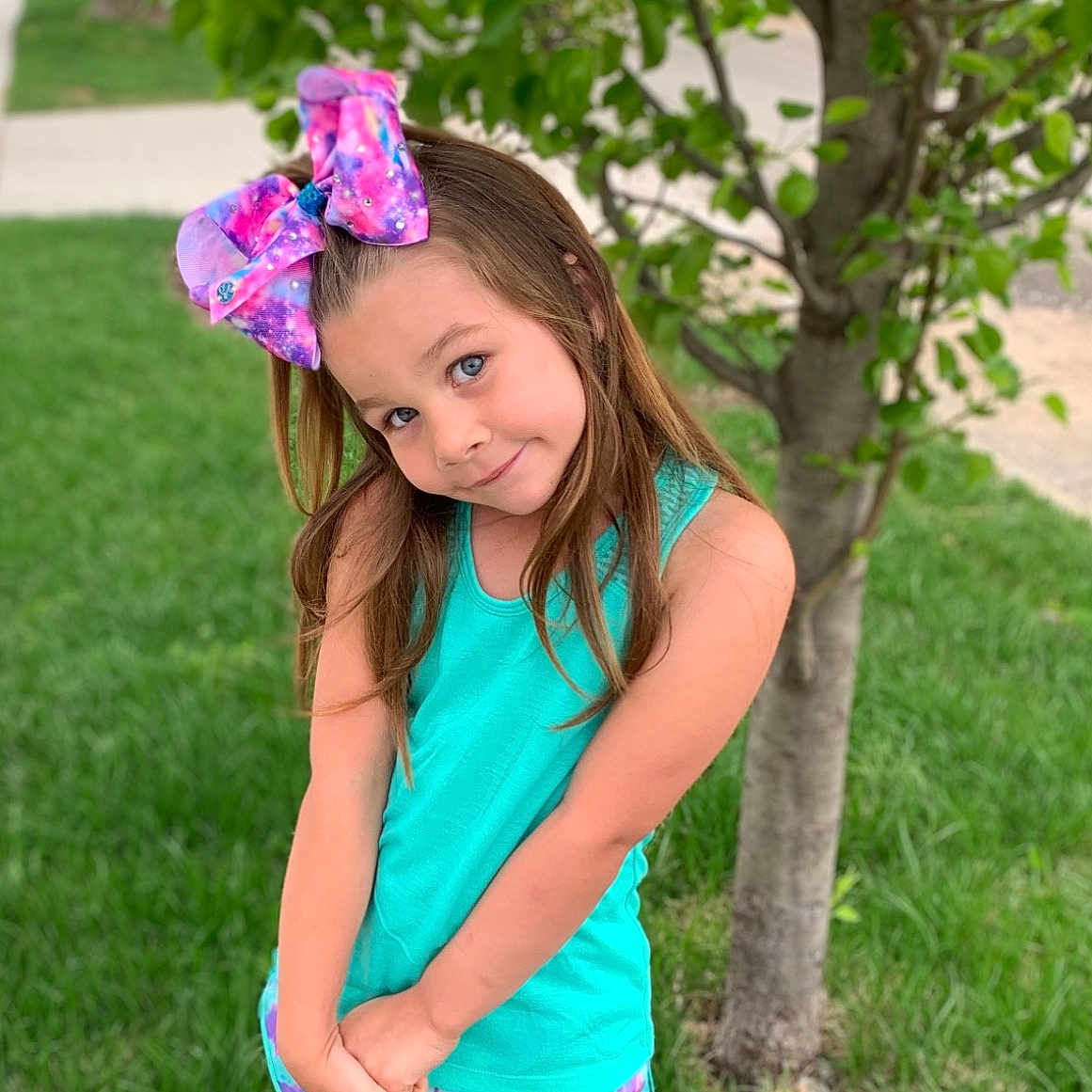 Brooklyn joined the competition — help win amazing prizes! beauty, blue, child, child_model, dress, fashion_accessory, flower, grass, green, hair_accessory, happy, joy, long_hair, pattern, person, photography, pink, plant, smile, spring