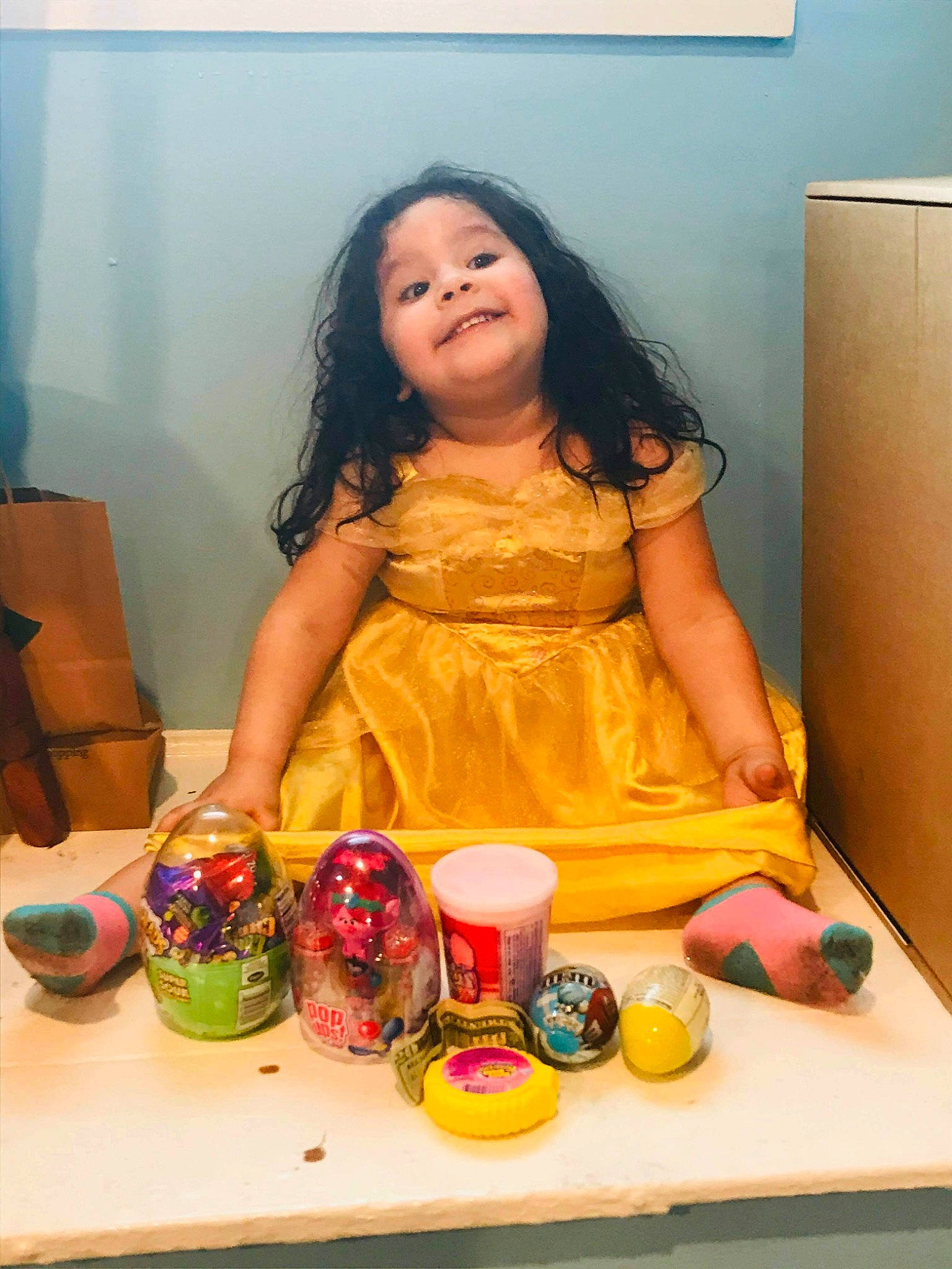 Nayla is registered to the contest to win money with this photo: bowl, chair, child, comfort_food, cooking, cup, drinkware, event, food, fun, happy, joy, mug, person, plate, serveware, sitting, smile, sweetness, table