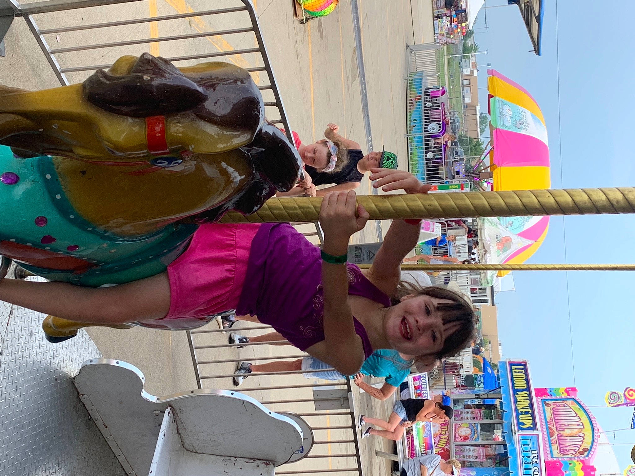 Alana is registered to the contest to win money with this photo: event, festival, fun, hat, headwear, joy, leisure, magenta, person, public_event, recreation, shorts, sky, smile, t_shirt, tourism, travel, vacation