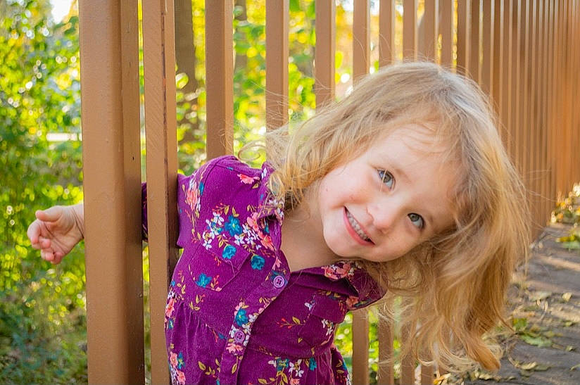 Eretria joined the competition — help win amazing prizes! blond, child, facial_expression, fun, garden, grass, happy, iris, joy, leisure, magenta, pattern, people_in_nature, person, plant, recreation, sitting, smile, summer, toddler