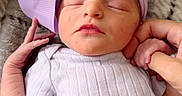 Kinsley joined the competition — help win amazing prizes! newborn, baby, infant, sleeping, bow, headwear, hand, blanket, soft, cozy, clothing, purple, pastel, resting, peaceful, portrait, human, skin, cute, small