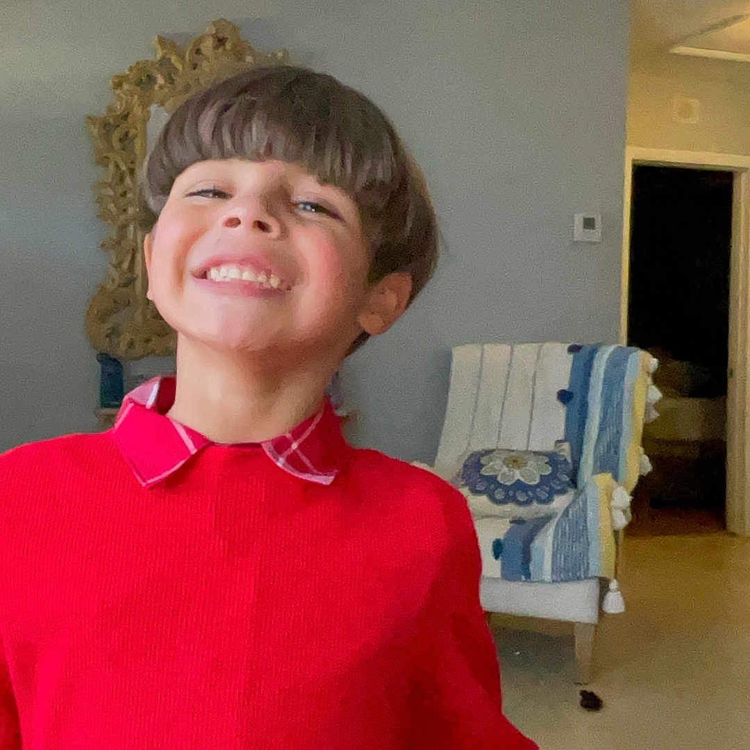 Jayden Noah is registered to the contest to win money with this photo: accessories, architecture, blouse, building, clothing, face, furniture, happy, head, indoors, jewelry, livingroom, longsleeve, necklace, person, photography, portrait, room, sleeve, smile