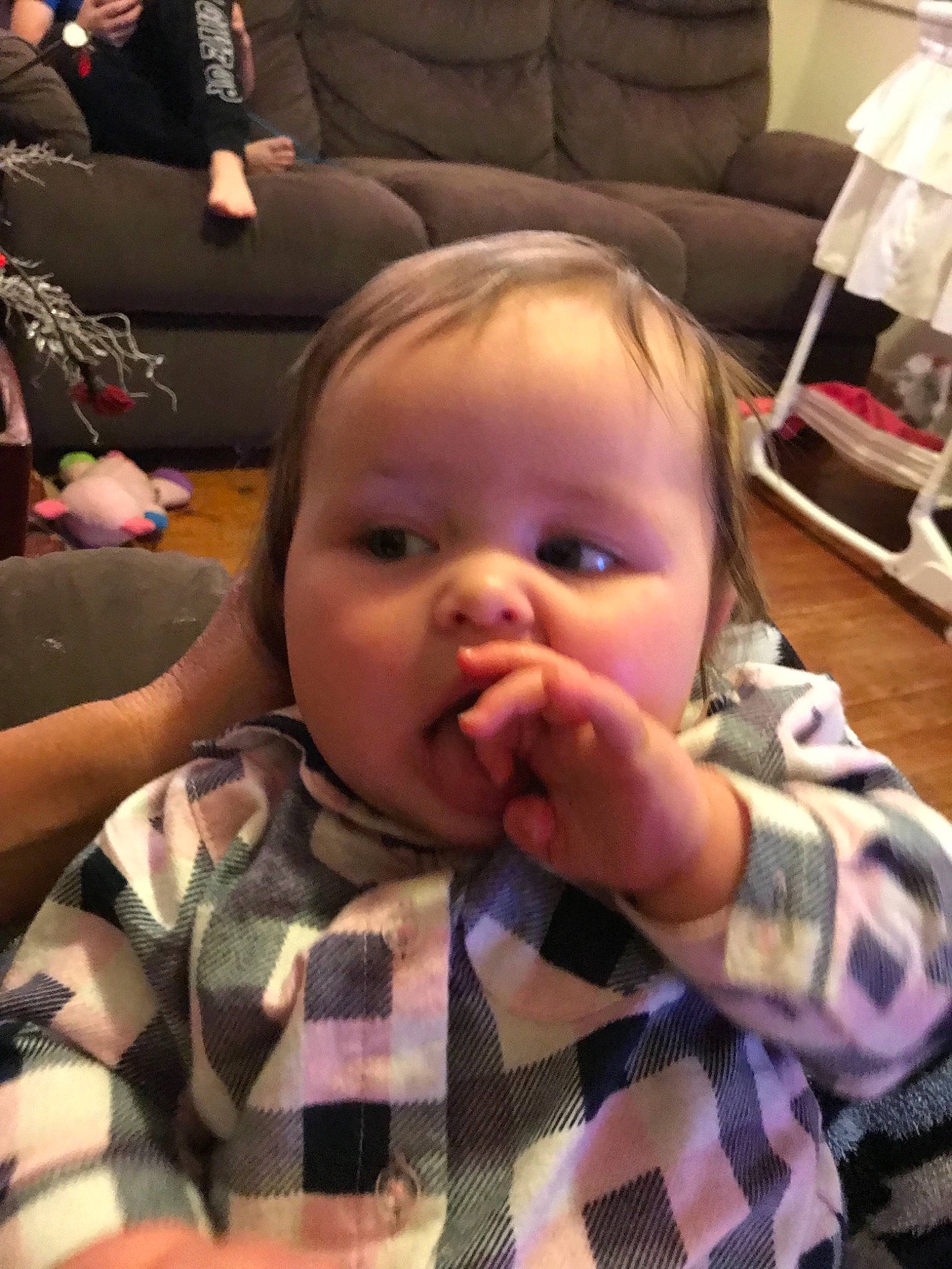 Ashanti is registered to the contest to win money with this photo: baby, cheek, child, design, ear, face, finger, head, mouth, nose, pattern, person, thumb, toddler