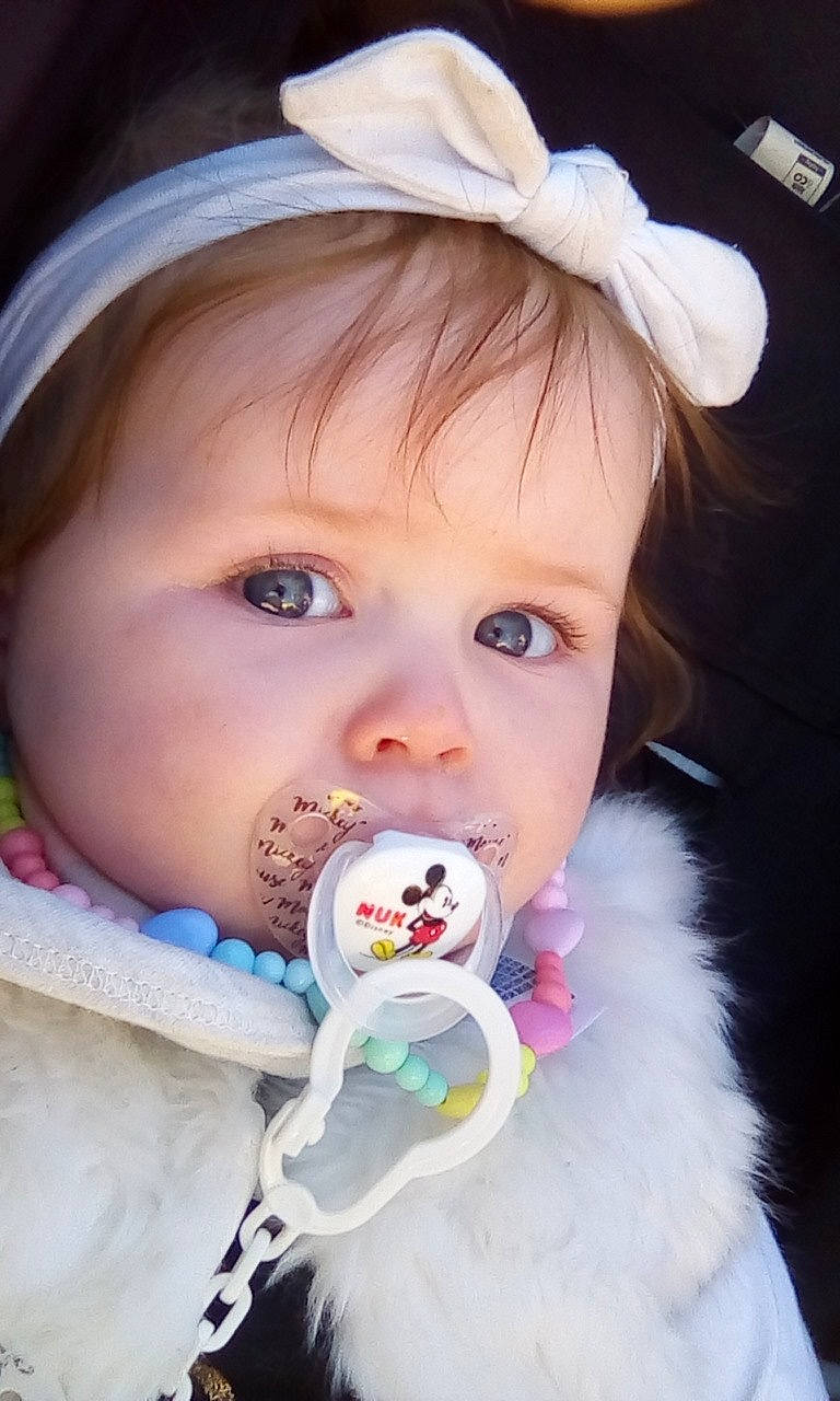 Ashanti is registered to the contest to win money with this photo: baby, cheek, child, hair_accessory, headgear, mouth, nose, person, smile, toddler